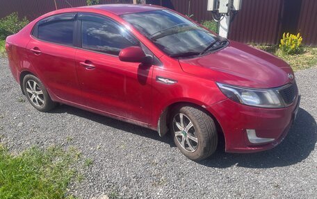 KIA Rio III рестайлинг, 2012 год, 750 000 рублей, 2 фотография