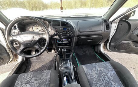 Mitsubishi Mirage VI рестайлинг, 2000 год, 250 000 рублей, 8 фотография