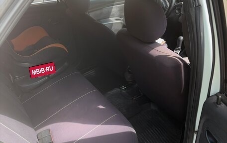 Renault Logan I, 2012 год, 170 000 рублей, 4 фотография