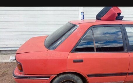 Mazda 323, 1991 год, 50 000 рублей, 16 фотография