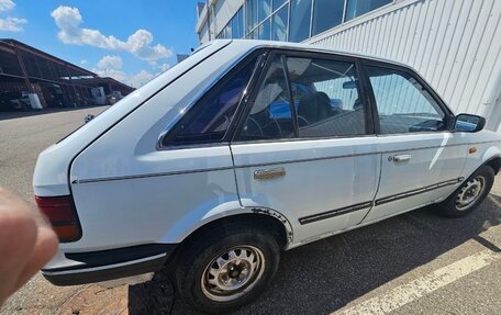 Mazda 323, 1986 год, 135 000 рублей, 15 фотография