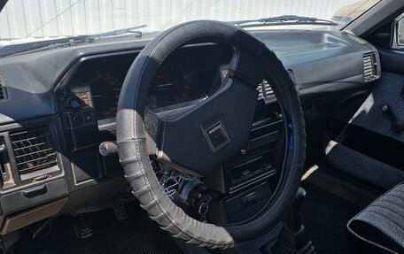 Mazda 323, 1986 год, 135 000 рублей, 11 фотография
