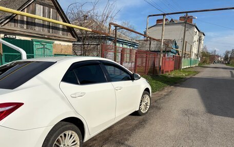 Toyota Corolla, 2013 год, 1 000 000 рублей, 5 фотография