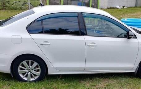 Volkswagen Jetta VI, 2013 год, 930 000 рублей, 4 фотография