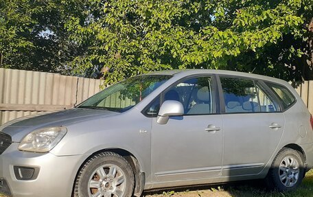 KIA Carens III (RP), 2010 год, 690 000 рублей, 2 фотография
