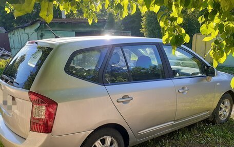 KIA Carens III (RP), 2010 год, 690 000 рублей, 4 фотография