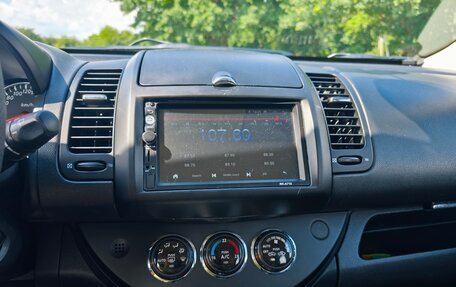 Nissan Note II рестайлинг, 2012 год, 859 000 рублей, 17 фотография