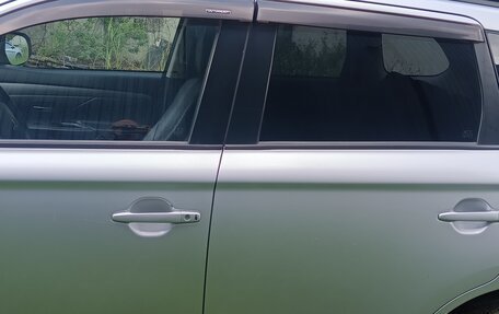 Mitsubishi Outlander III рестайлинг 3, 2012 год, 1 390 000 рублей, 11 фотография
