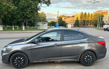 Hyundai Solaris II рестайлинг, 2011 год, 420 000 рублей, 24 фотография