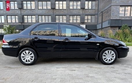Mitsubishi Lancer IX, 2009 год, 590 000 рублей, 2 фотография