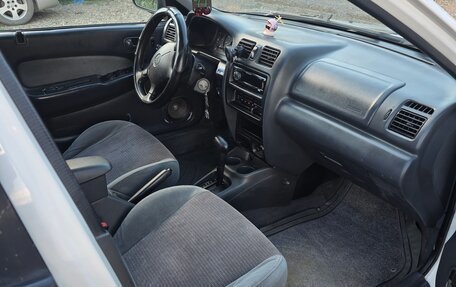 Mazda Protege, 1998 год, 220 000 рублей, 7 фотография