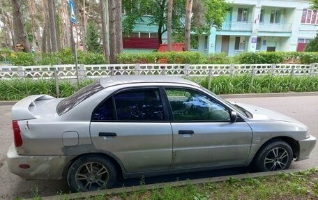 Mitsubishi Mirage VI рестайлинг, 2000 год, 100 000 рублей, 3 фотография