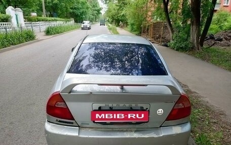 Mitsubishi Mirage VI рестайлинг, 2000 год, 100 000 рублей, 4 фотография