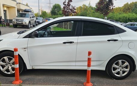 Hyundai Solaris II рестайлинг, 2013 год, 730 000 рублей, 2 фотография