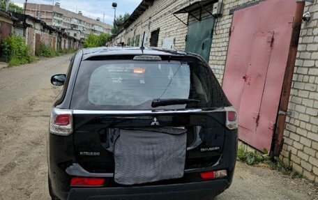 Mitsubishi Outlander III рестайлинг 3, 2013 год, 1 550 000 рублей, 4 фотография