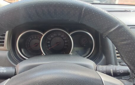 Nissan Tiida, 2010 год, 800 000 рублей, 7 фотография