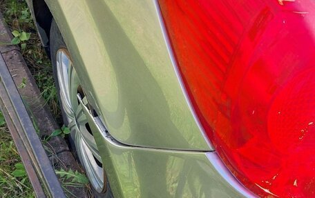 Nissan Tiida, 2004 год, 380 000 рублей, 11 фотография