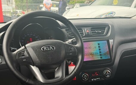 KIA Rio III рестайлинг, 2012 год, 700 000 рублей, 26 фотография