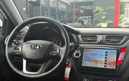 KIA Rio III рестайлинг, 2012 год, 700 000 рублей, 27 фотография