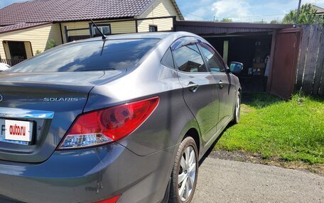 Hyundai Solaris II рестайлинг, 2011 год, 800 000 рублей, 4 фотография
