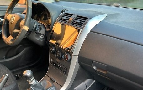 Toyota Corolla, 2011 год, 900 000 рублей, 11 фотография