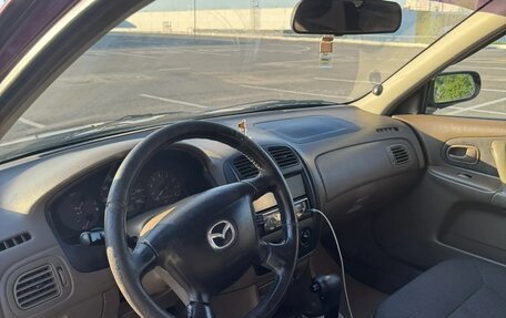 Mazda 323, 1999 год, 345 000 рублей, 7 фотография