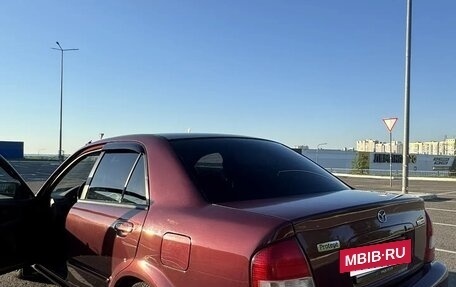 Mazda 323, 1999 год, 345 000 рублей, 5 фотография