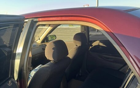 Mazda 323, 1999 год, 345 000 рублей, 8 фотография