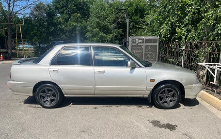 Daihatsu Applause I рестайлинг, 1998 год, 230 000 рублей, 3 фотография
