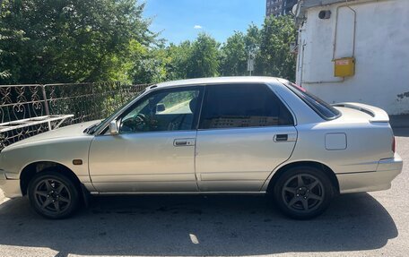 Daihatsu Applause I рестайлинг, 1998 год, 230 000 рублей, 2 фотография