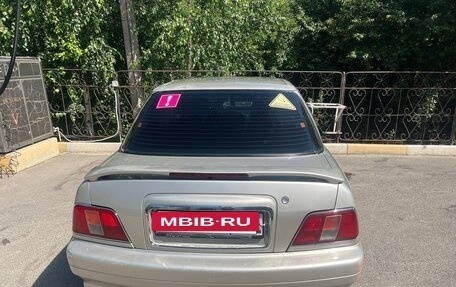 Daihatsu Applause I рестайлинг, 1998 год, 230 000 рублей, 6 фотография