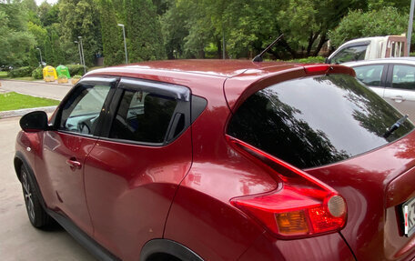 Nissan Juke II, 2011 год, 750 000 рублей, 14 фотография