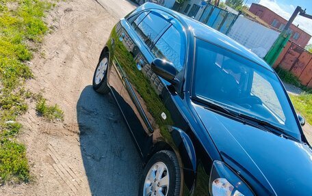 KIA Rio II, 2011 год, 570 000 рублей, 13 фотография