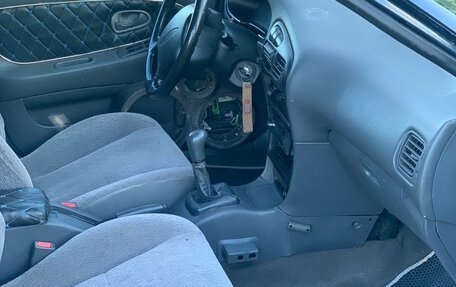 Mitsubishi Lancer VII, 1995 год, 148 000 рублей, 9 фотография