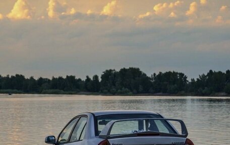 Mitsubishi Lancer VII, 1999 год, 310 000 рублей, 8 фотография
