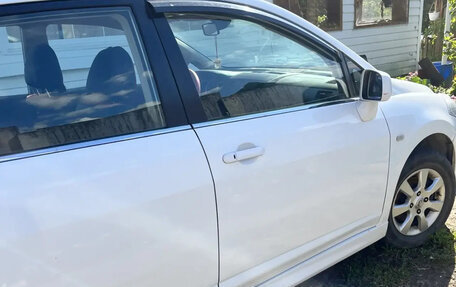 Nissan Tiida, 2010 год, 780 000 рублей, 6 фотография