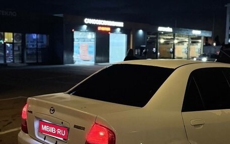 Mazda Familia, 1999 год, 165 000 рублей, 3 фотография