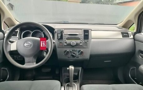 Nissan Tiida, 2010 год, 590 000 рублей, 12 фотография