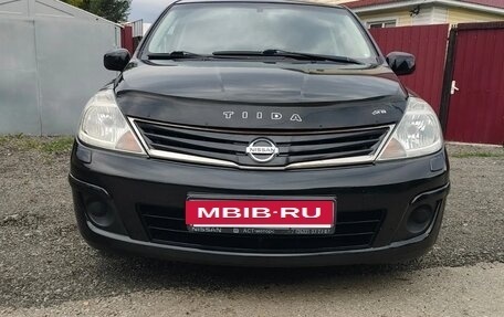 Nissan Tiida, 2010 год, 590 000 рублей, 7 фотография