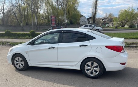 Hyundai Solaris II рестайлинг, 2013 год, 860 000 рублей, 2 фотография