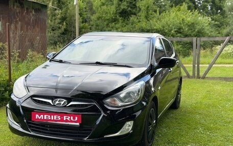 Hyundai Solaris II рестайлинг, 2012 год, 700 000 рублей, 19 фотография