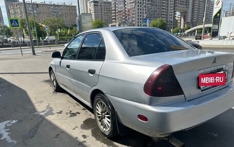 Mitsubishi Mirage VI рестайлинг, 2000 год, 190 000 рублей, 2 фотография