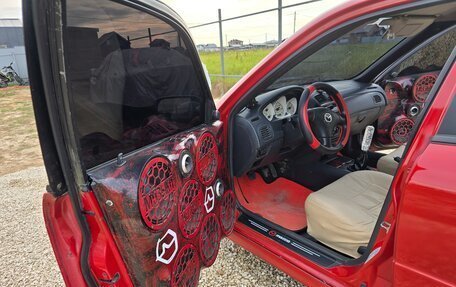 Mazda Protege, 2001 год, 320 000 рублей, 10 фотография