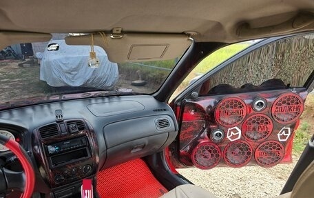 Mazda Protege, 2001 год, 320 000 рублей, 12 фотография