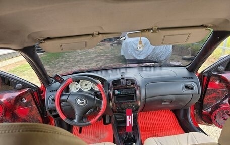 Mazda Protege, 2001 год, 320 000 рублей, 11 фотография