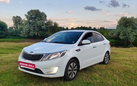 KIA Rio III рестайлинг, 2012 год, 550 000 рублей, 2 фотография