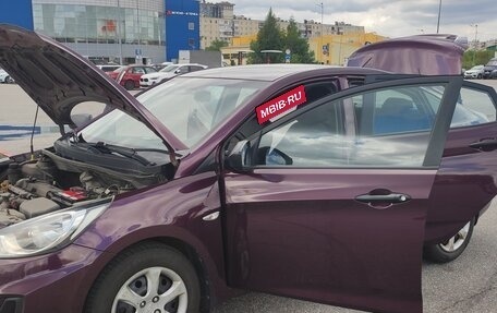 Hyundai Solaris II рестайлинг, 2011 год, 650 000 рублей, 19 фотография