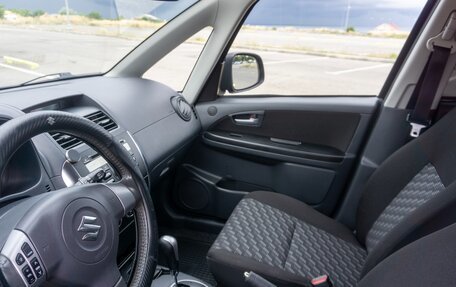 Suzuki SX4 II рестайлинг, 2009 год, 1 100 000 рублей, 14 фотография