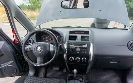 Suzuki SX4 II рестайлинг, 2009 год, 1 100 000 рублей, 32 фотография