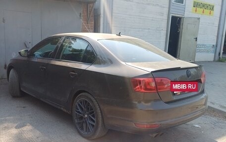 Volkswagen Jetta VI, 2011 год, 950 000 рублей, 3 фотография